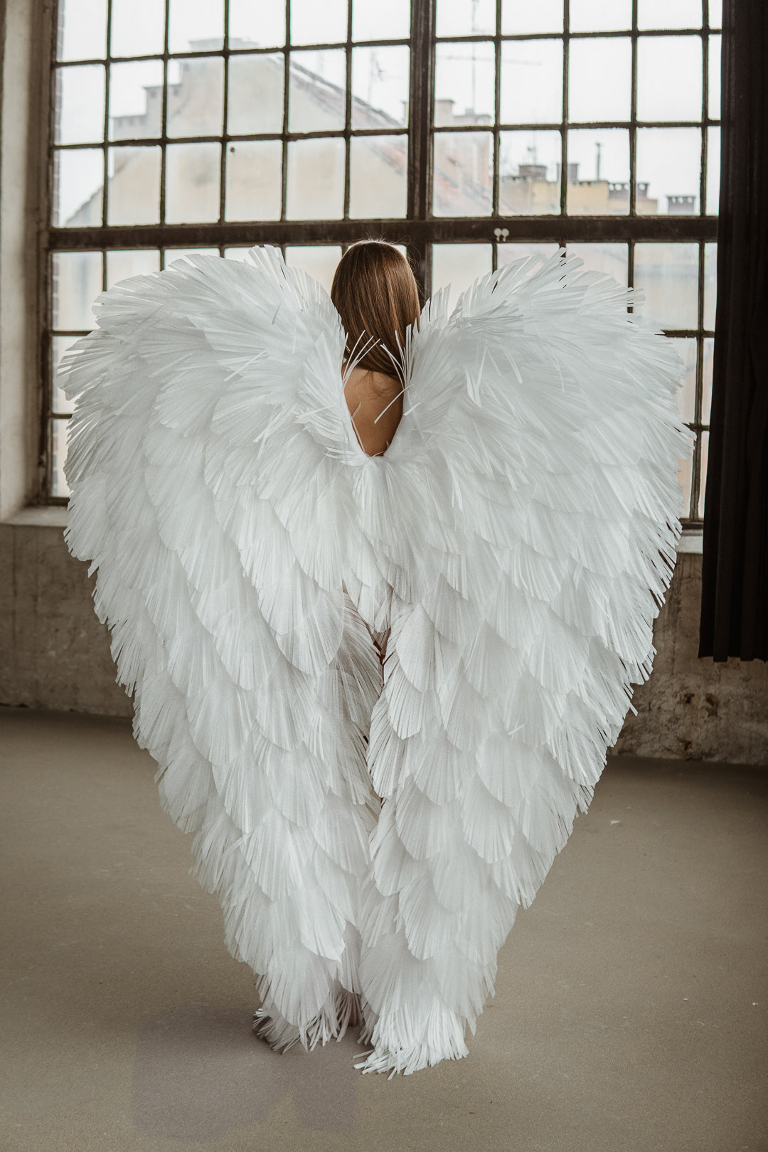 Białe skrzydła anioła na sesje zdjęciową "marki Bogacci"