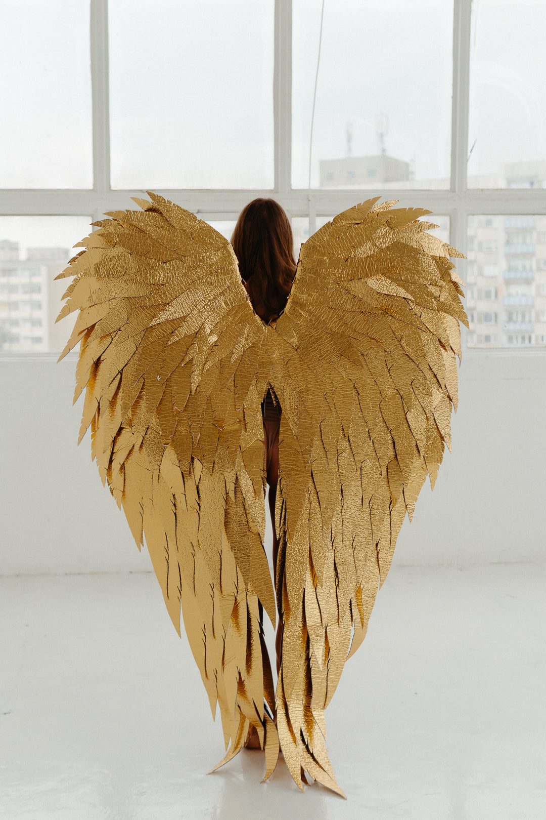 Złote skrzydła anioła na sesje zdjęciową "marki Bogacci"